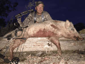 Jamie with a good size white boar.