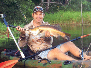 The author’s first barra from a kayak.