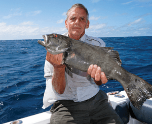 A dark trout hooked by George around Lamont Reef.