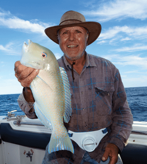 Manny Vayanos landed a typical parrotfish from a small rubble patch.