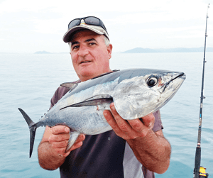 Gus Ferliano nabbed a quality tuna on a shiny slug cast at a huge bust-up.