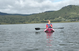 The author’s girlfriend Carly enjoyed having a paddle and a fish on the final morning of the trip.