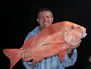 The author was glad to get the monkey off his back with a cracker red in the boat.