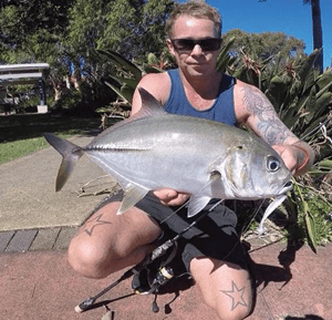 Justin Peacock with a bigeye trevally hooked at the Parrearra weir.