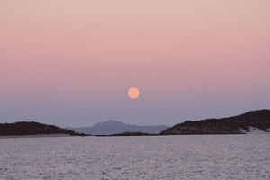 The full moon was setting as the sun was rising over Great Keppel Island.