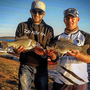 Jaimen Tunstall and the author with two 40cm-plus fish from Lake Barambah.