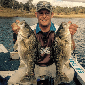 The author with two 50cm-plus Boondooma bass.