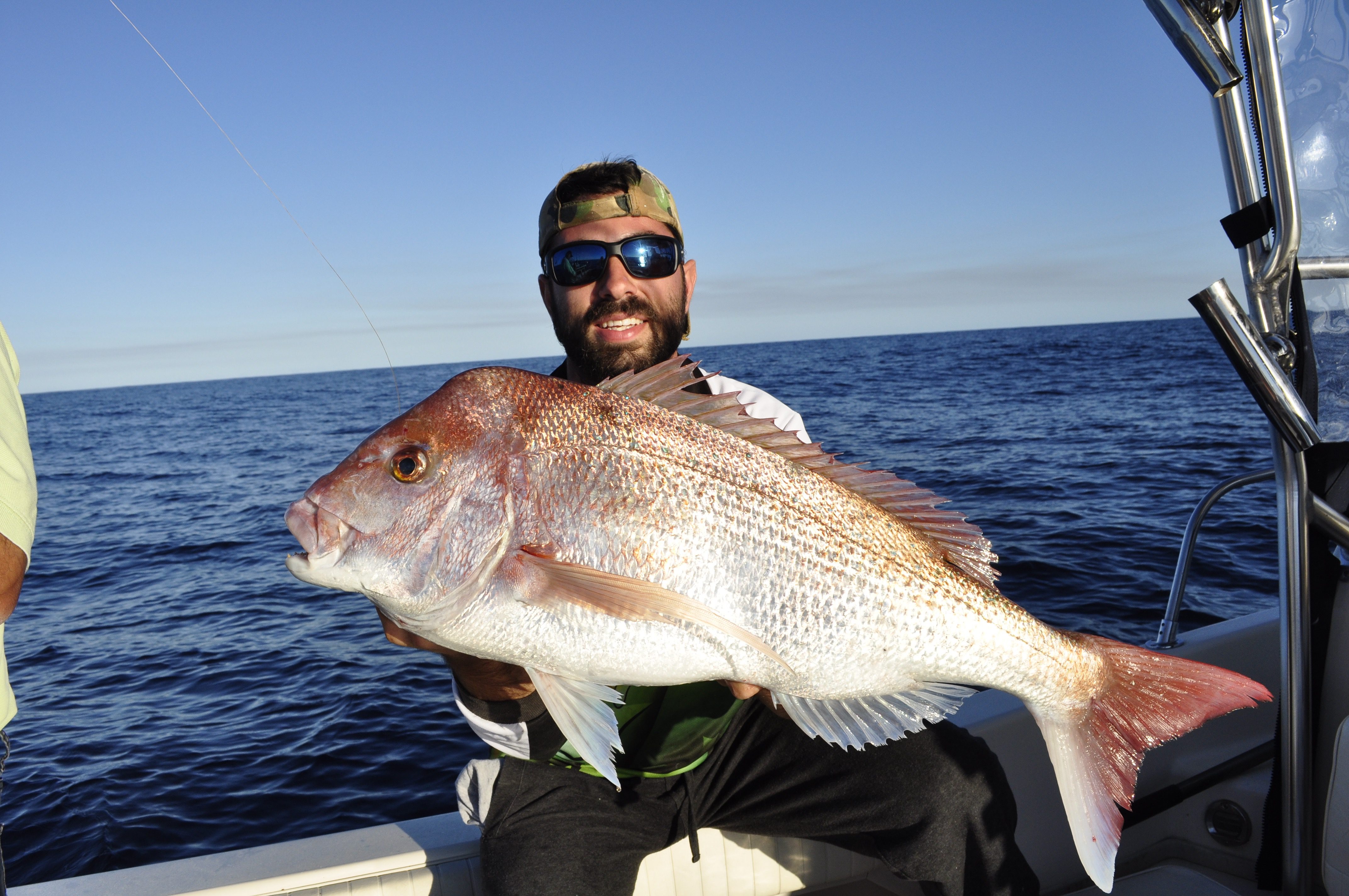 Peter with a quality snapper that fell to a float line rig.