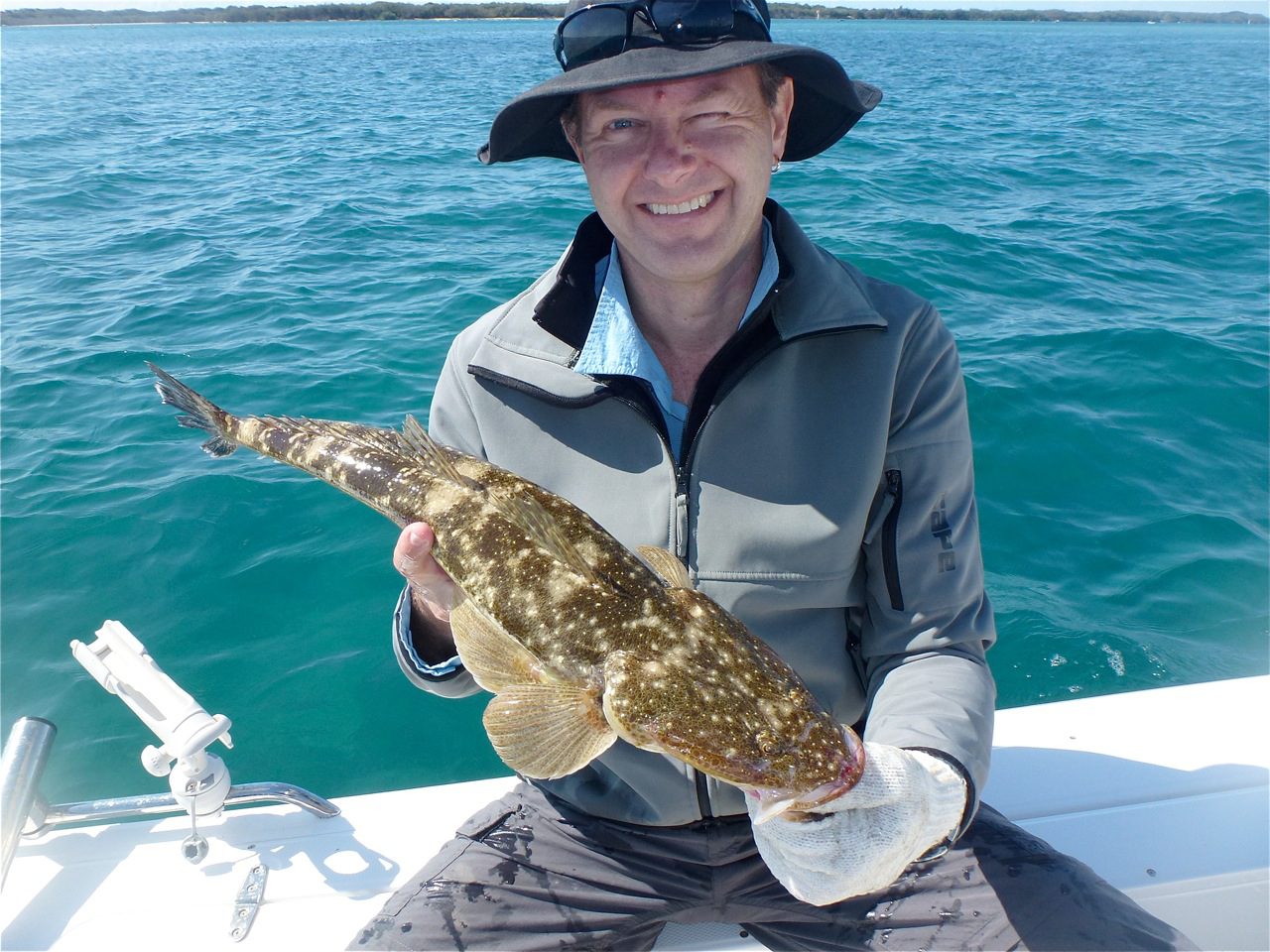 Marty with one of the many flathead captured recently in the Broadwater. This one fell victim to a small soft plastic.