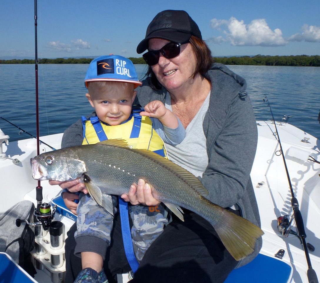 Pam and Tyler with a small jew that hit a soft plastic in the Broadwater.