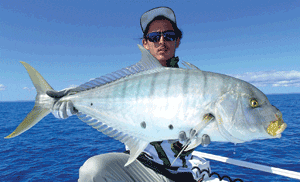 Tide Apparel member Michael with one of the many golden trevally stung by the Tide boys.