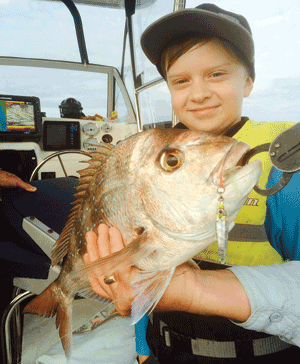 Young Dom with a personal-best 53cm snapper caught on a Zerek Chilli Padi jig.
