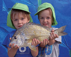 Eli and Harley Milful won the $50 Davo’s Fish of the Week prize with this 40cm bream. Photo: noosafishing.com.au
