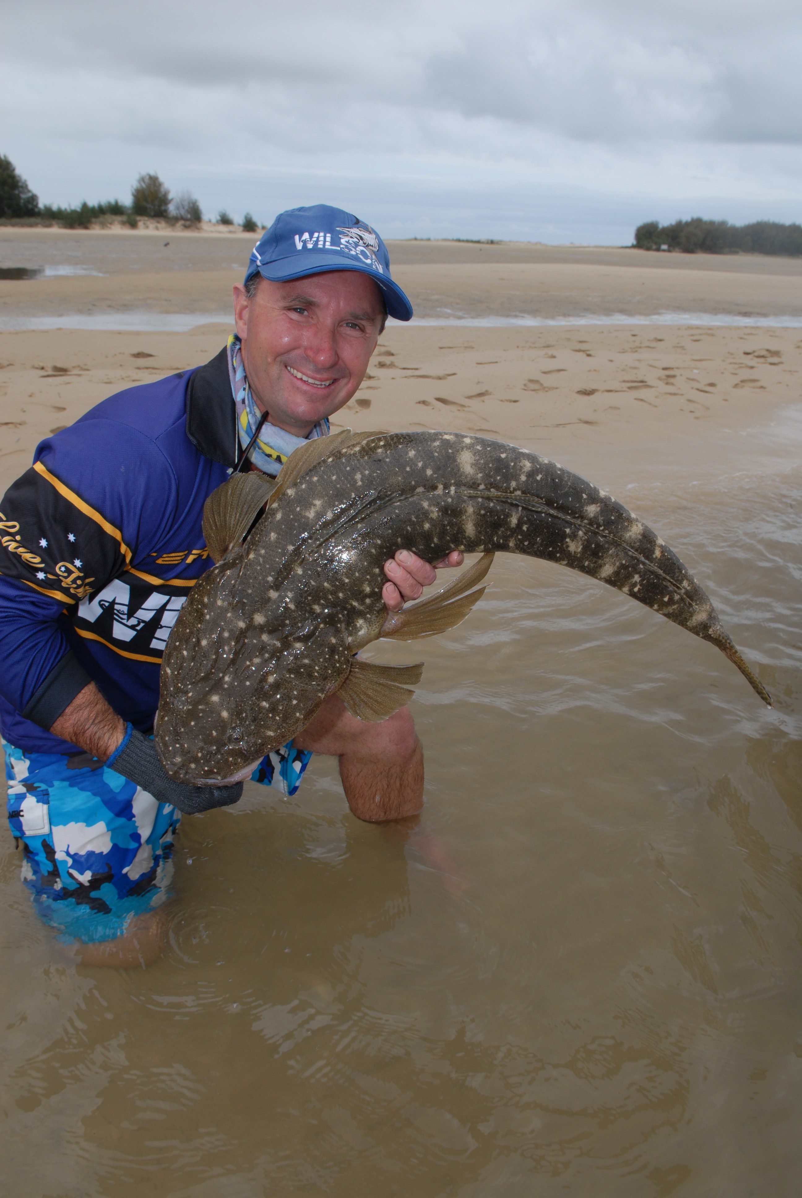 Rob Payne with a 95cm flathead taken while trolling in the shallows at South Stradbroke Island.