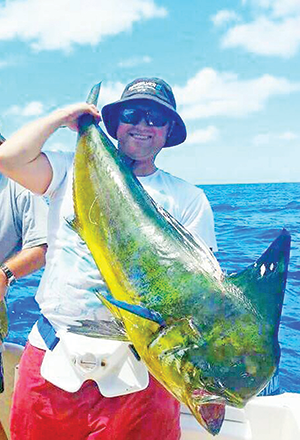 Jeff Maher and a bull mahi mahi. 