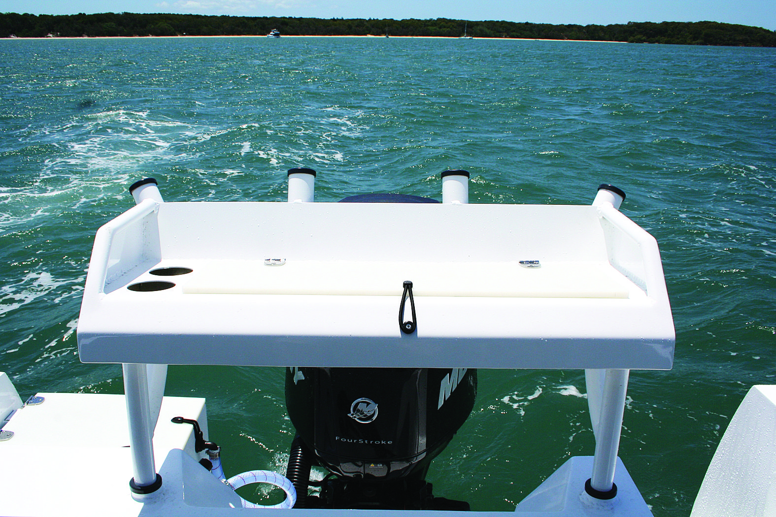 The bait board gives you a good amount of cutting space and doesn’t impede on fishing room.