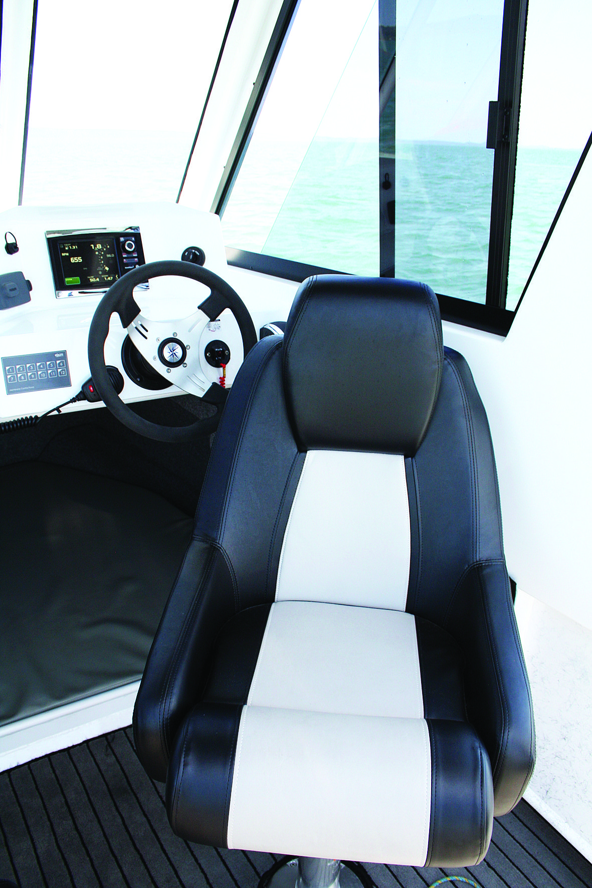 A hard top gives you such a great sense of security when at the helm and punching through a sloppy sea.