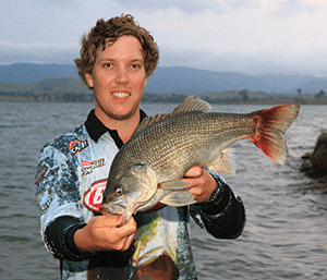 Matt Gilbert with the 2.52kg Atomic Big Bass. 