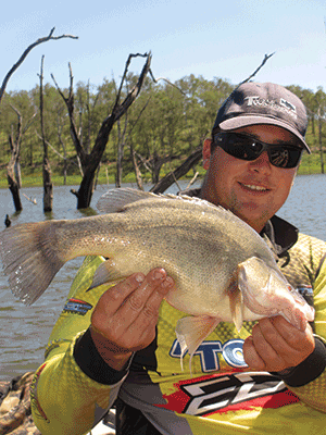 Cody was all smiles after landing this golden perch. These fish go hard on light gear.