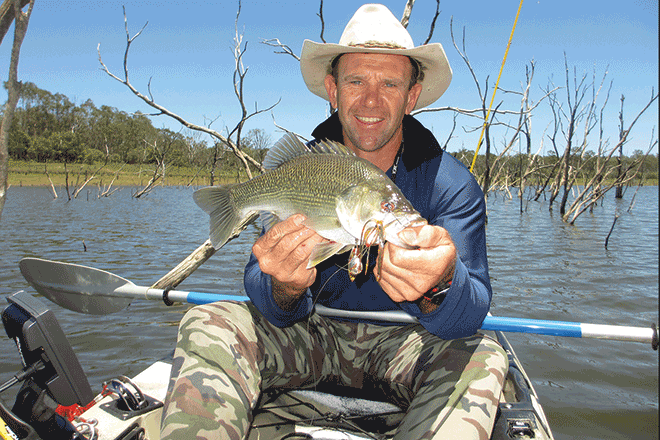 Slow rolling spinnerbaits adjacent to the timber was the method for catching the timid bass. 