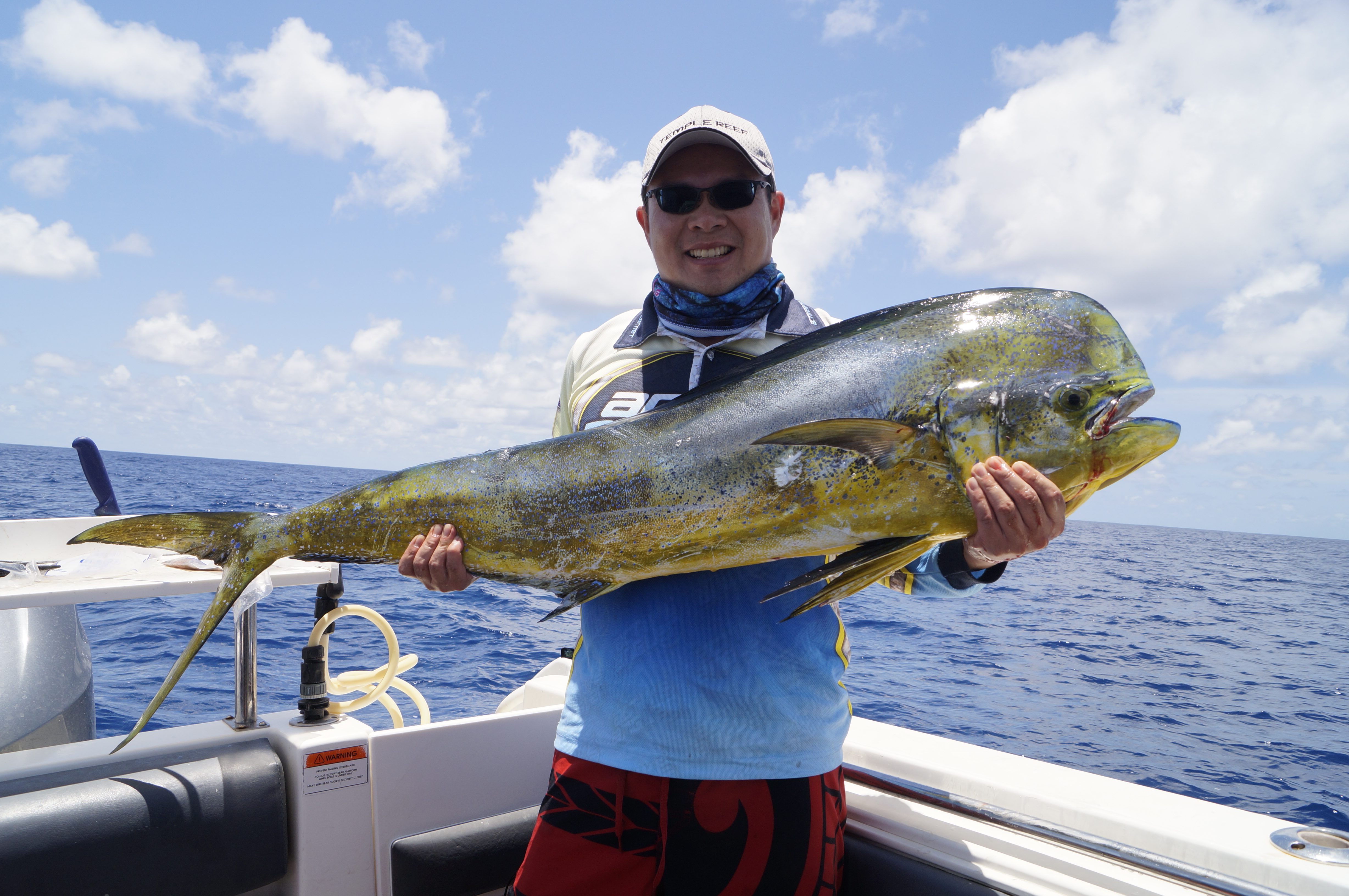 Glenn Han with his PB dolphinfish.