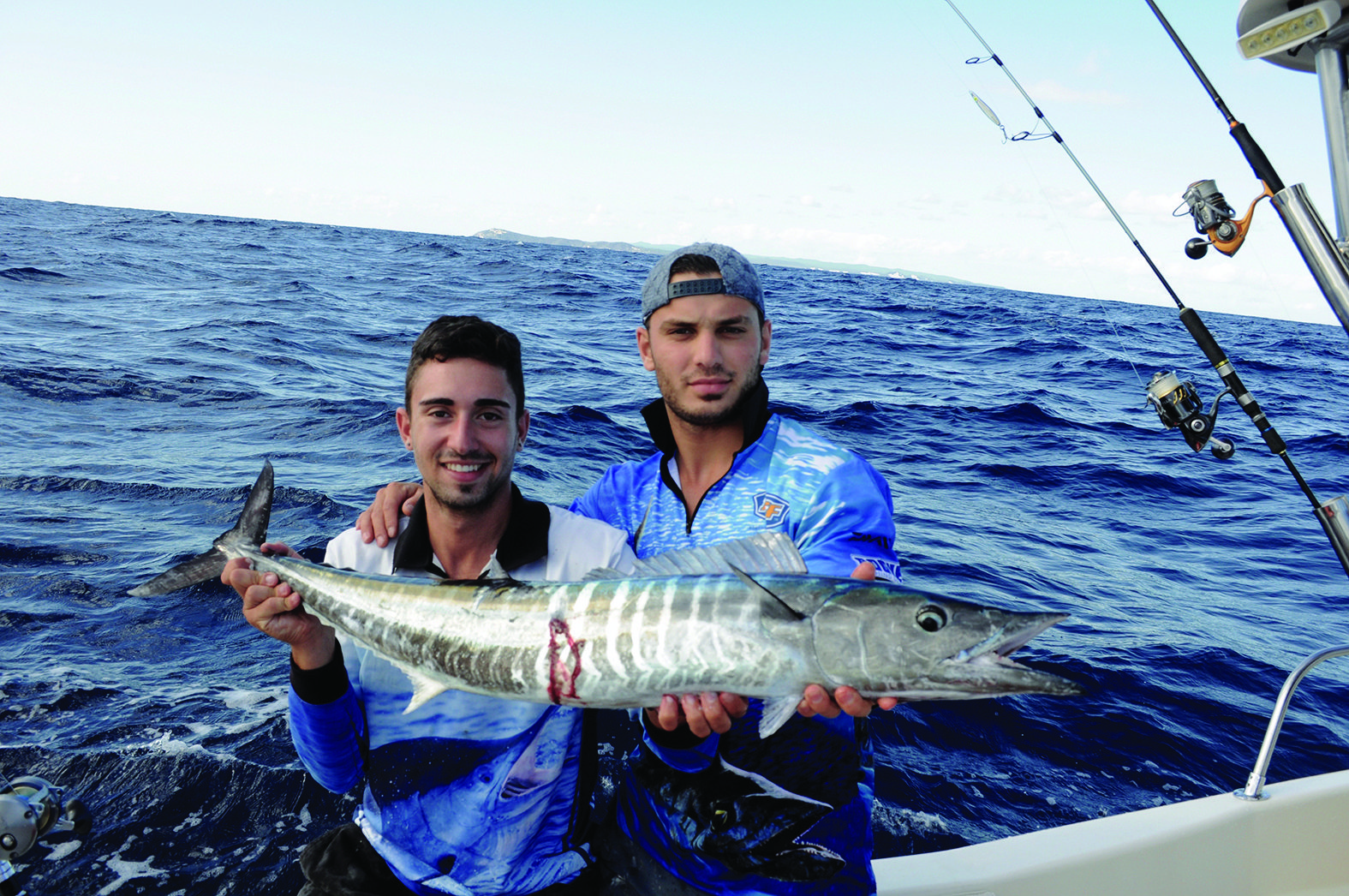 Mati and Pana with a little wahoo that fell to a metal slug off Moreton Island.