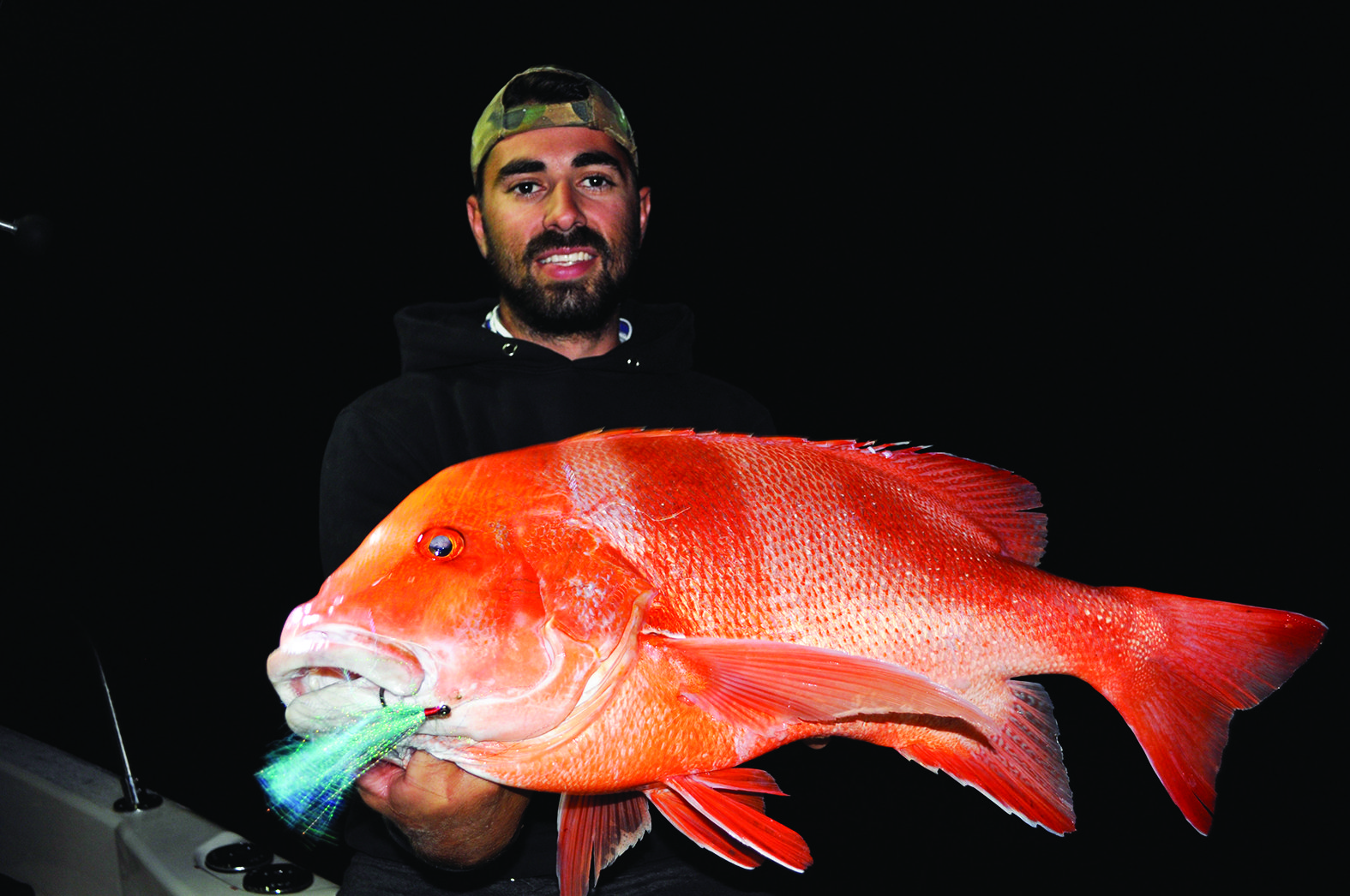 A stunning red nabbed by Peter on a large whole squid.