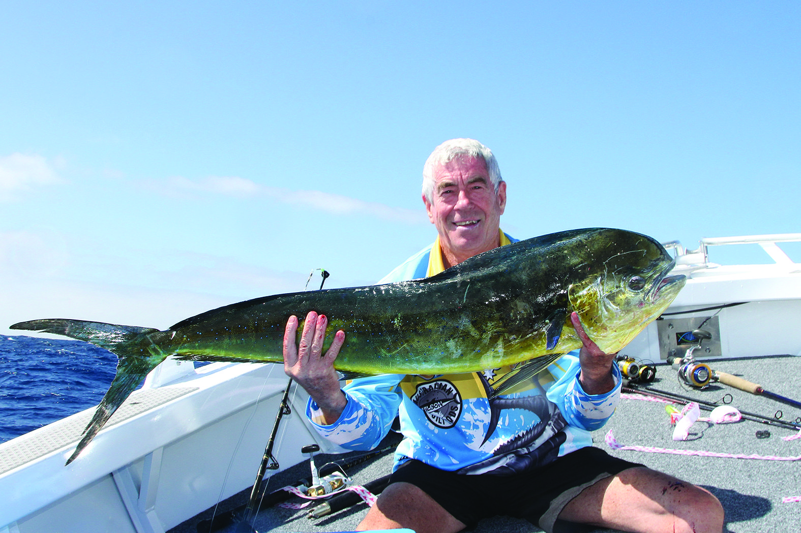 Ron Winnet with a dolphin fish caught in sloppy conditions.