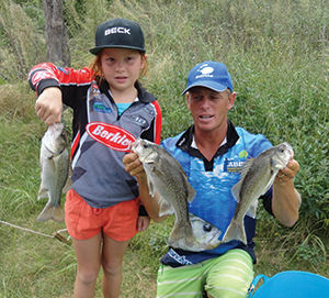 Taleisha and Daniel Brooks of the Sunshine Coast with their haul of bass. 