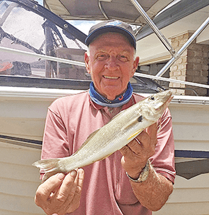 Len ‘Snowy’ Hargraves with a decent daytime whiting taken from the Jumpinpin area.