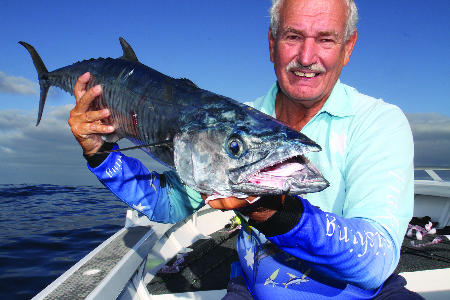 Frank Oostenbroek with a spanish mackerel: The author and a spanish mackerel taken just south of Hutchisons Shoal. 