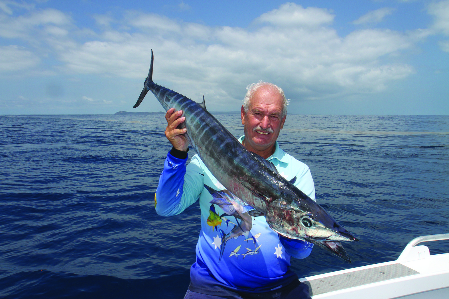 Frank Oostenbroek with a wahoo: A wahoo boated by the author on Hutchisons Shoal. 