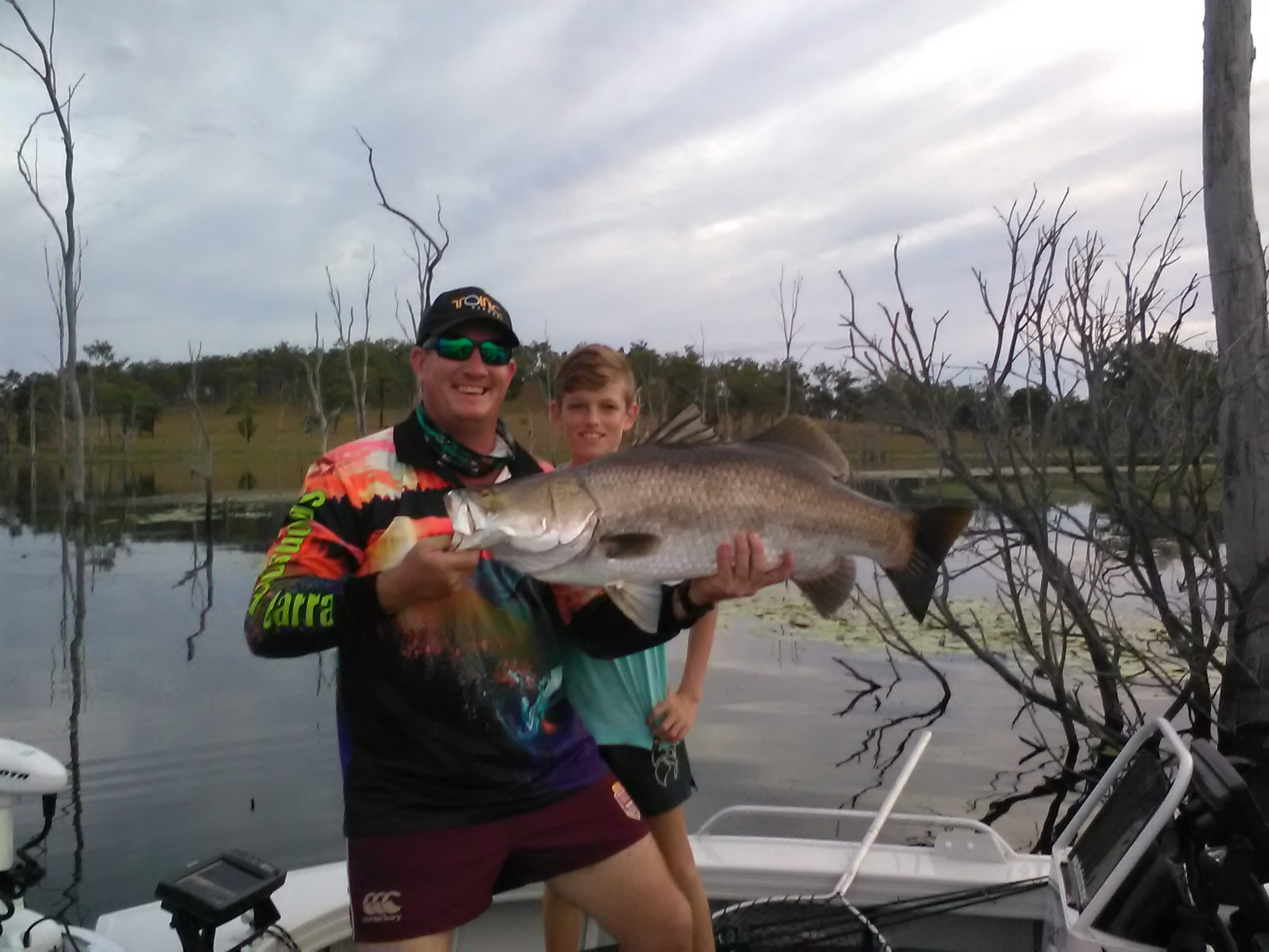 Dale Smith and his son Matthew with the barramundi they landed at Lake Monduran last weekend.