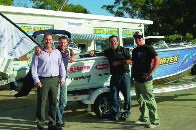 Mark Devitt, Michael Guest and owner of Huett Marine Craig Huett presented the Stacer Outlaw to this year's major prize winner Dave Lindsay.
