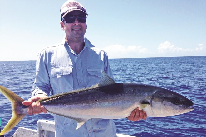 Nathan Mitchell with a 10.2kg kingfish hooked on a floating pillie and 25lb line.
