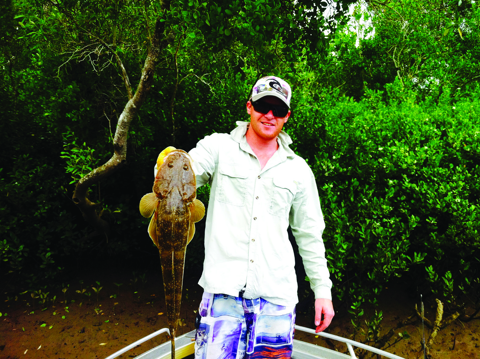 This flathead was caught while observing a mud flat that had baitfish scattering along its banks. A few casts later and Andrew was on.