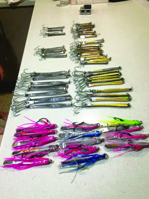 A stash of metal lures made from stainless butter knives and ready for testing.
