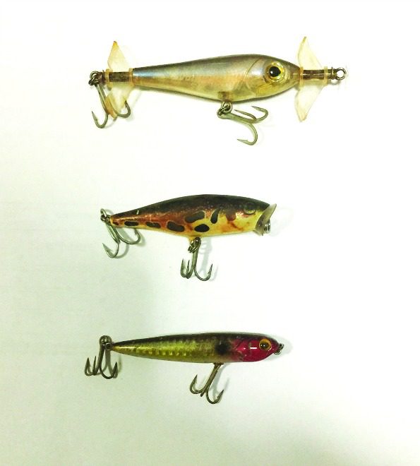 Surface lures from top to bottom: Fizzer with twin props, Rapala Skitter Pop popper, surface stickbait.
