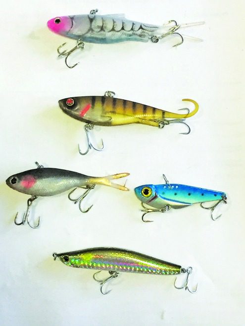 Vibration lures from top to bottom: Samaki Vibelicious, Zerek Fish Trap, Threadybuster (left), metal blade (right) and Kamikaze 96S Sinking Stickbait.