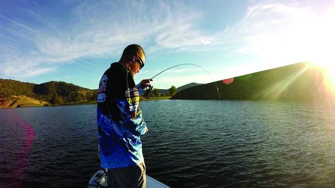 Scott McIntyre hooked up to a solid bass while deep jigging with a Lox rod.