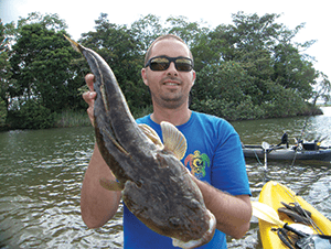 The author with by-catch of flathead. 