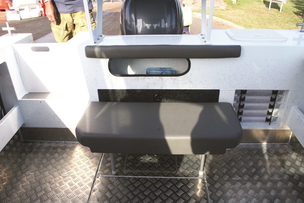 Storage abounds on the 630 HT, even at the transom. Custom-designed Plano tackle storage solutions a neat touch.