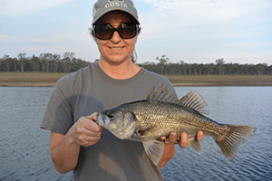 Annette Montebello scored a bass from the edge on a lipless crank. 