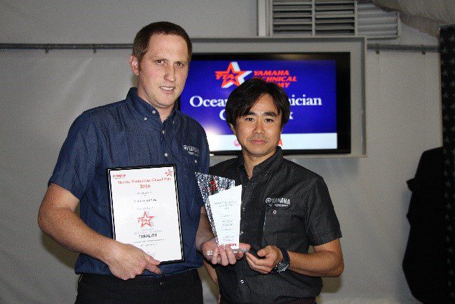 Mathew receives his award from Mr Mike Endo Director Yamaha Motor Australia.